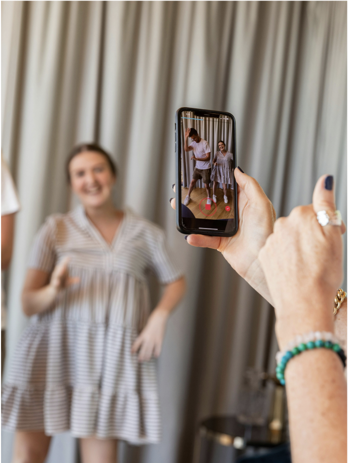 Smiling man with hands on cheeks
